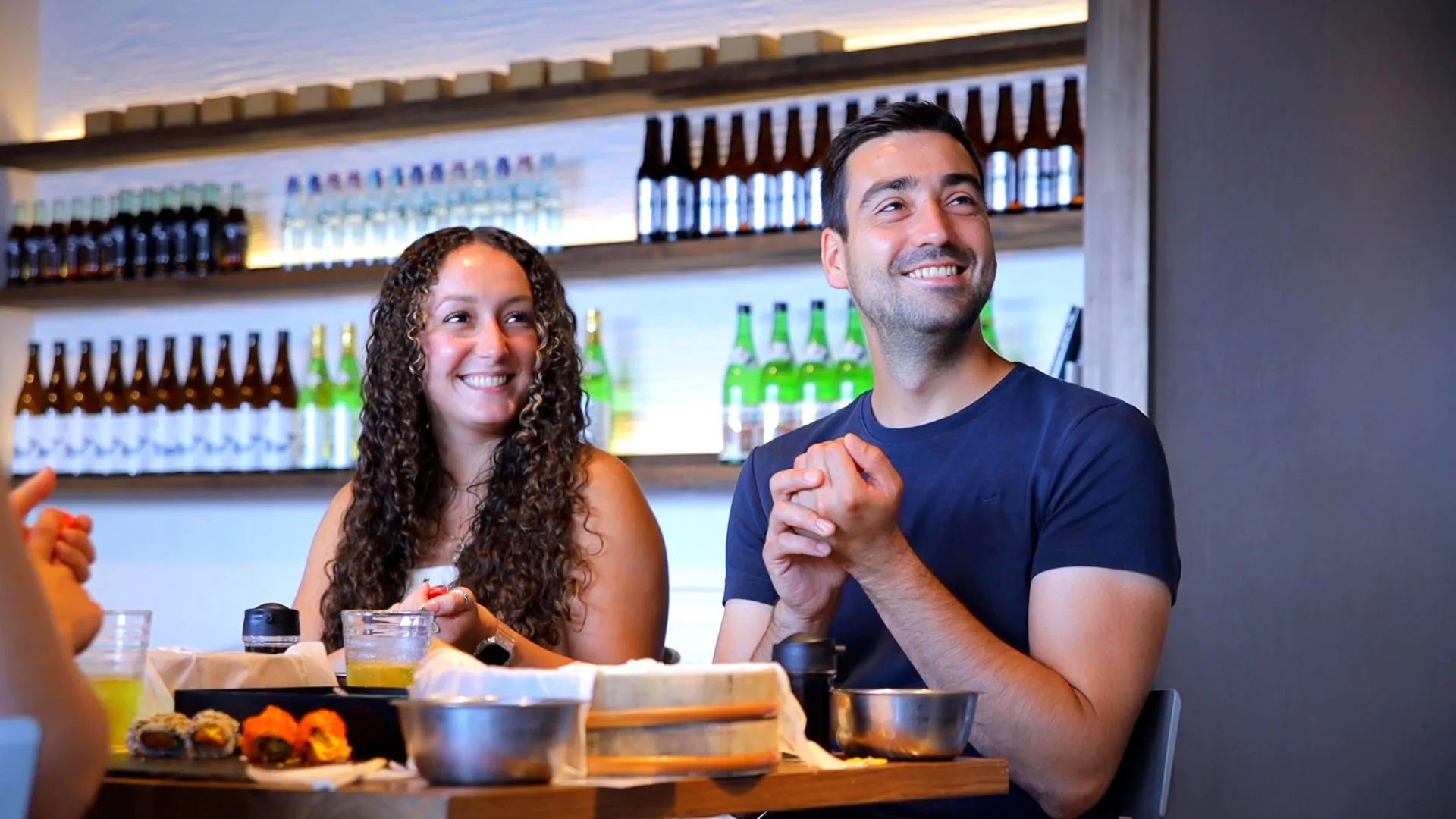 Group of tourists enjoying sushi making activity